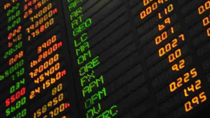 Looking up at a computerized stocks-value board at the Philippine Stock Exchange, tags: der progressive corporation - CC BY-SA